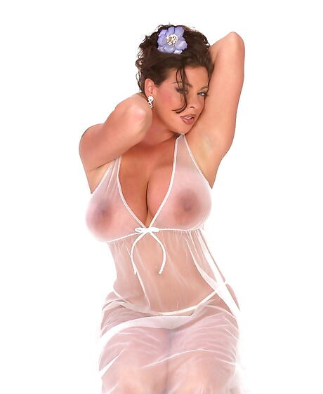 Deluxe brittish milf Linsey Dawn Mckenzie bares big boobs and sexy ass 